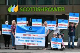 Members of Falkirk's Forgotten Villages Ending Fuel Poverty campaign protest outside Scottish Power's headquarters in Glasgow