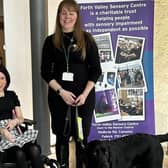 MSP Pam Duncan-Glancy meets Laura Cluxton and her guide dog Sadie at the Forth Valley Sensory Centre stand in Holyrood