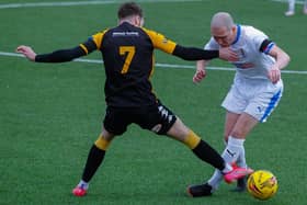 Michael Gemmell (right) gets stuck in against Berwick Rangers (Pic by Scott Louden)