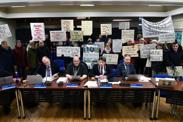 Banner waving protesters inside the council meeting in Grangemouth. Pic: Michael Gillen