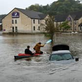 Cousins Thomas Grozier, of Bainsford, and Ben Brown, of Whitecross, kayaking in the Brewers Fayre car park at Polmont. Pic: Michael Gillen