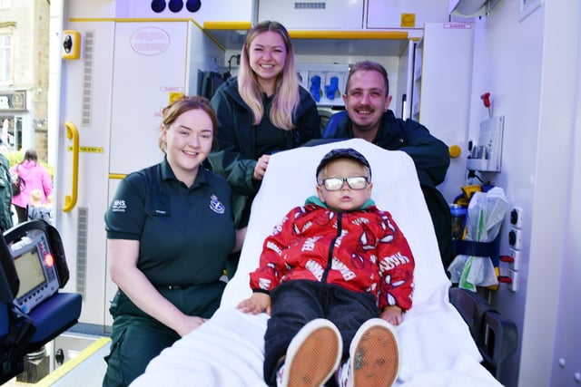 Lyle Snedden, 3, from Falkirk gets special treatment from these Scottish Ambulance Service workers.
