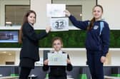 Magdalene, Lana with the winning Holy Family entry, and Vianne show off winning designs that are set to feature on the town’s three canal bridges.