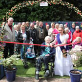 Bo’ness Fair Queen Ellie Van Der Hoek cut a ribbon to declare the garden open, ably assisted by patient Margaret King.