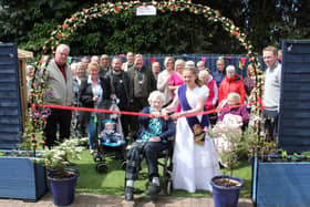 Bo’ness Fair Queen Ellie Van Der Hoek cut a ribbon to declare the garden open, ably assisted by patient Margaret King.