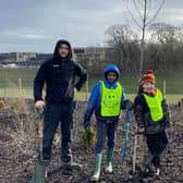 Pupils at Holy Family RC Primary School planting trees in Winchburgh.