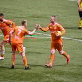 Veteran striker Andy Rodgers grabbed a hat-trick in the 7-0 win