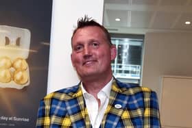 Battler: Doddie Weir in his famous tartan suit.