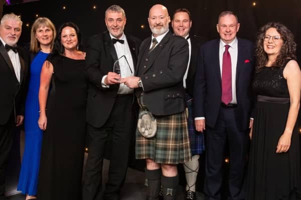 Principal Kenny MacInnes and other representatives from Forth Valley College receive the prestigious award
(Picture: Submitted)