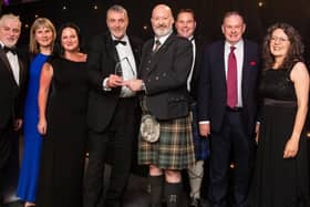 Principal Kenny MacInnes and other representatives from Forth Valley College receive the prestigious award
(Picture: Submitted)