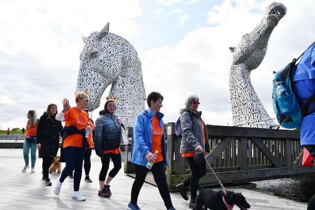 The fundraising walk started at the Kelpies on Friday evening.  Picture: Michael Gillen.
