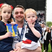 Stephen McGinn and family during Falkirk's League One trophy day celebrations (Photo: Michael Gillen)