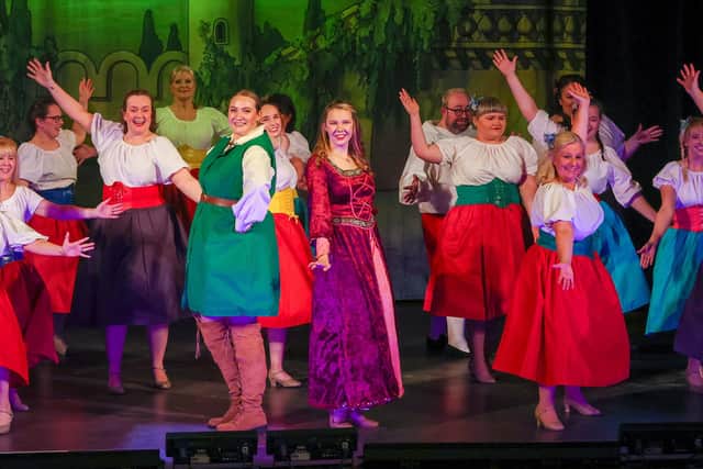Robin Hood and Maid Marion with LMT's pantomime chorus