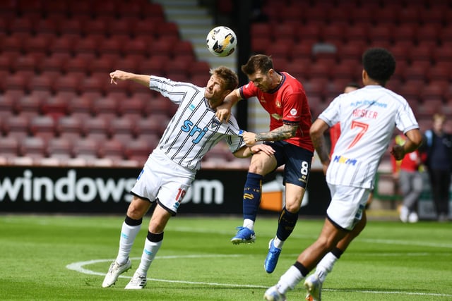 Brad Spencer wins the ball at during an airborne encounter at East End Park