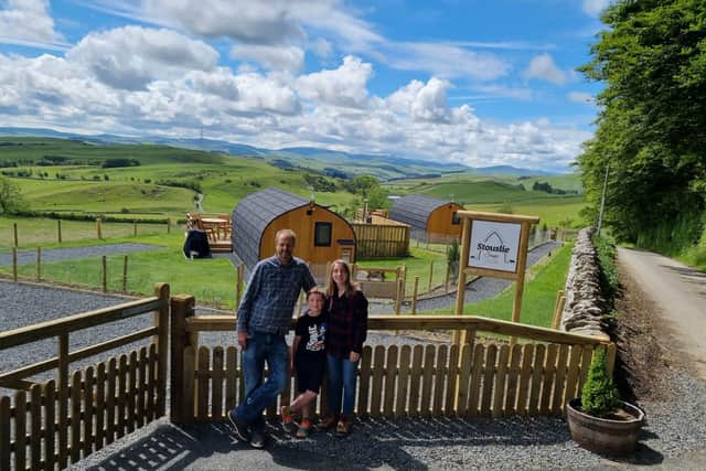 happy glampers: Stewart and Carly Anderson and their son