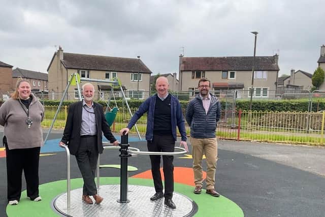 Deputy leader Paul Garner, centre right, alongside Councillor Alf Kelly, centre left, estates development officer Katie Drummond and parks team leader Mike Ewart at Hollandbush Park. Pic: Falkirk Council
