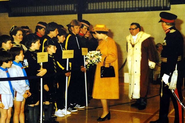 HM The Queen meets local youngsters in the Mariner Centre.