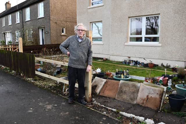 John Berry said council roughcasting contractors removed his fence and gate and failed to put them back up
(Picture: Michael Gillen, National World)