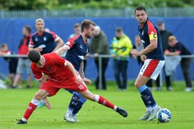 Brad Spencer and Stephen McGinn in action for Falkirk (Photo: Michael Gillen)