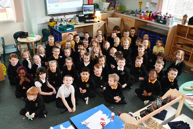 P1 pupils from P1BC, P2/1 and P1T classes at Maddiston Primary in their new learning space at Wallacestone Primary. Pic: Michael Gillen
