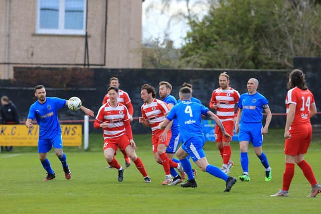 Bo'ness' players track back looking to halt a dangerous Bonnyrigg Rose attack (Pictures: Joe Gilhooley LRPS)