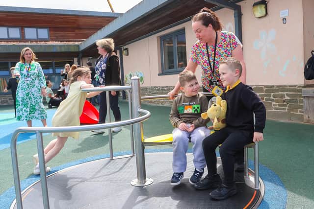 Pupils at Maddiston Primary School's Timezone enjoying the new playground