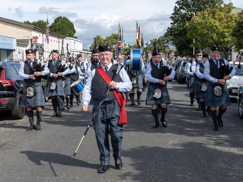 The pipes and drums upbeat tunes kept smiles on faces throughout the parade