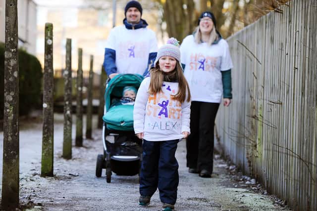 Denny five-year-old Alex Jeffrey is walking 5k for five days to fundraise for Home-Start Falkirk with her mum Sally, dad Andrew and 14-month-old brother Jack. Picture: Michael Gillen.