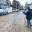 Councillor Hyslop and local Councillor Norrie Work on the High Street.