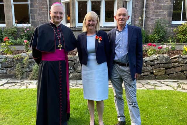 From left, Archbishop Leo Cushley, Angela Hughes and husband Malcolm.