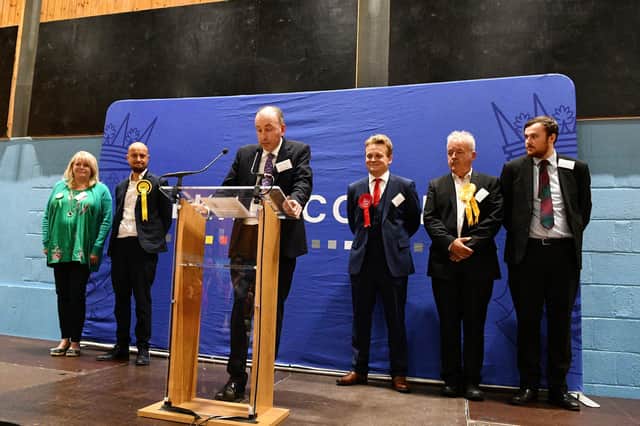 Returning officer Kenneth Lawrie declares that Labour's Euan Stainbank is the new MP for Falkirk. Also on the stage are Rachel Kidd (Greens), Toni Giugliano (SNP), Tim McKay (Lib Dem) and James Bundy (Conservative). Pic: Michael Gillen