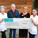 Malky Finlayson is joined by auxiliary nurse Yvonne Edwards, fundraising administrator Diane Harrison ans auxiliary nurse Caragh Walker as he presents £5440 cheque to Strathcarron Hospice
(Picture: Michael Gillen, National World)