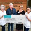 Malky Finlayson is joined by auxiliary nurse Yvonne Edwards, fundraising administrator Diane Harrison ans auxiliary nurse Caragh Walker as he presents £5440 cheque to Strathcarron Hospice
(Picture: Michael Gillen, National World)
