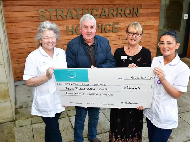 Malky Finlayson is joined by auxiliary nurse Yvonne Edwards, fundraising administrator Diane Harrison ans auxiliary nurse Caragh Walker as he presents £5440 cheque to Strathcarron Hospice
(Picture: Michael Gillen, National World)