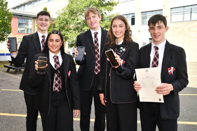 Braes High pupils with their results, left to right, Ben Adams, Amna Anwar, Max Macaulay, and Emily Dagger, who all received their results via text, while Harry Lawson found out his results in the post