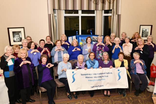 Members of Falkirk Soroptimists International strike the #InspireInclusion pose ahead of International Women's Day on March 8. Pic: Michael Gillen