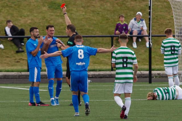 Nicky Locke looks stunned to receive his marching orders against Celtic B (Pic by Michael Gillen)