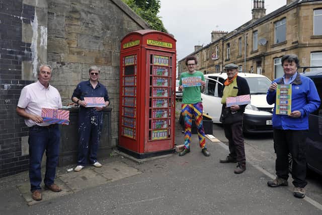 Edinburgh-based artist Richard Duffy with Falkirk Made Friends members beside an old K6 phone box at Ladysmill Bridge, Falkirk which was made in Carron Ironworks. Pictured with the phone box are Bill Paterson, FMF member; John, a fellow FMF member; artist, Richard Duffy; Duncan Comrie, FMF secretary; and Robert Bissett, FMF chairman. Picture: Michael Gillen.