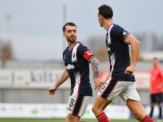 Falkirk midfielder Brad Spencer with team-mate Liam Henderson (Photo: Michael Gillen)