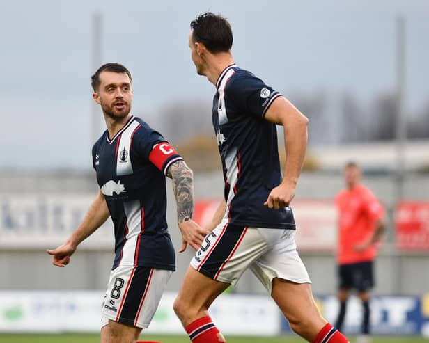 Falkirk midfielder Brad Spencer with team-mate Liam Henderson (Photo: Michael Gillen)