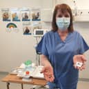 Forth Valley Royal Hospital nurse Julie MacDonald with the Cytosponge device