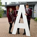 Falkirk High School pupils celebrating success. Pictured: Tamsin Gold, 17, five A Highers; Daniel Gray, 16, seven A National 5s; and Finlay Morrison, 16, five A Highers. Pic: Michael Gillen.