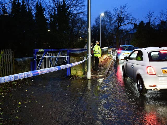 Police taped off the footbridge next to the Union Canal. Pic: Michael Gillen