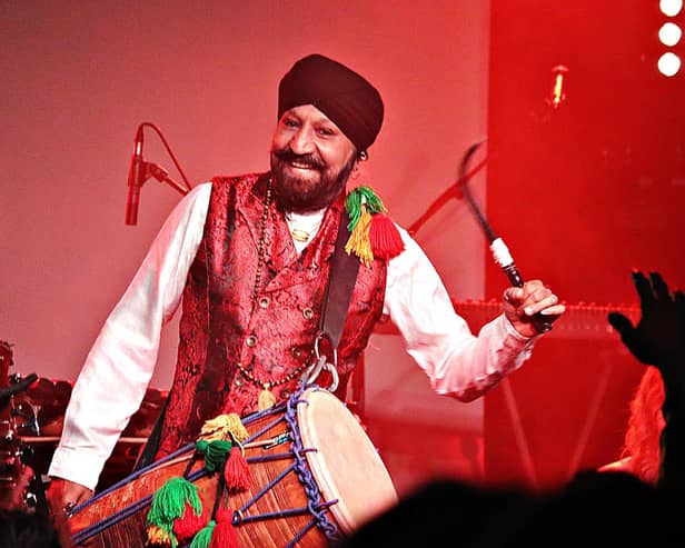 Band stalwart Johnny Kalsi performing.
