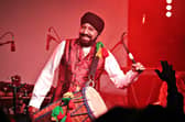 Band stalwart Johnny Kalsi performing.
