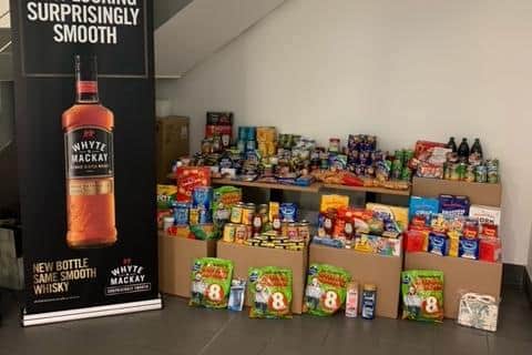 The team at Whyte and Mackay collected together a large quantity of food items for the donation