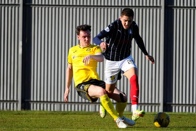 Goalscorer Jaze Kabia is dispossessed