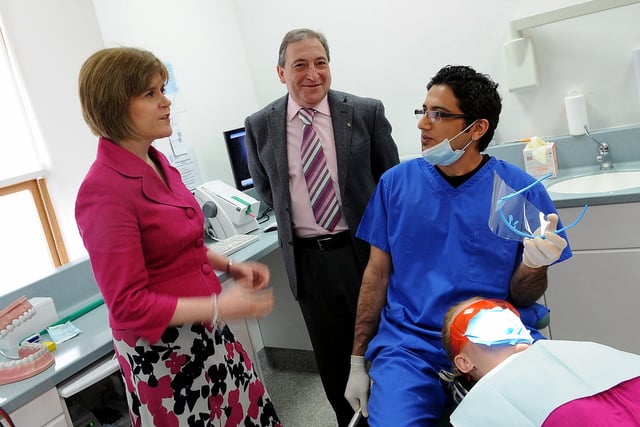 Falkirk Dental Care. Nicola Sturgeon, John McNally, dentist Ali Baloch and patient Yvonne Cochrane.