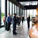 Guide Claire tells visitors about the new whisky stills - a replica of the ones used previously which mysteriously disappeared. Pic: Michael