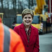 First Minister Nicola Sturgeon during a visit to Irvine. Ms Sturgeon has announced extra Covid restrictions will be lifted from Monday. Picture: Andy Buchanan - WPA Pool/Getty Images